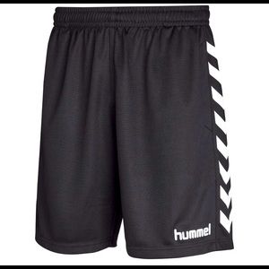 Black and grey hummel athletic shorts.